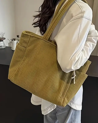 Tilda – Ribakujuline kott nööriga detailiga
